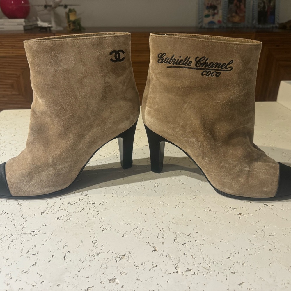 Authentic Chanel beige boots with satin toe.